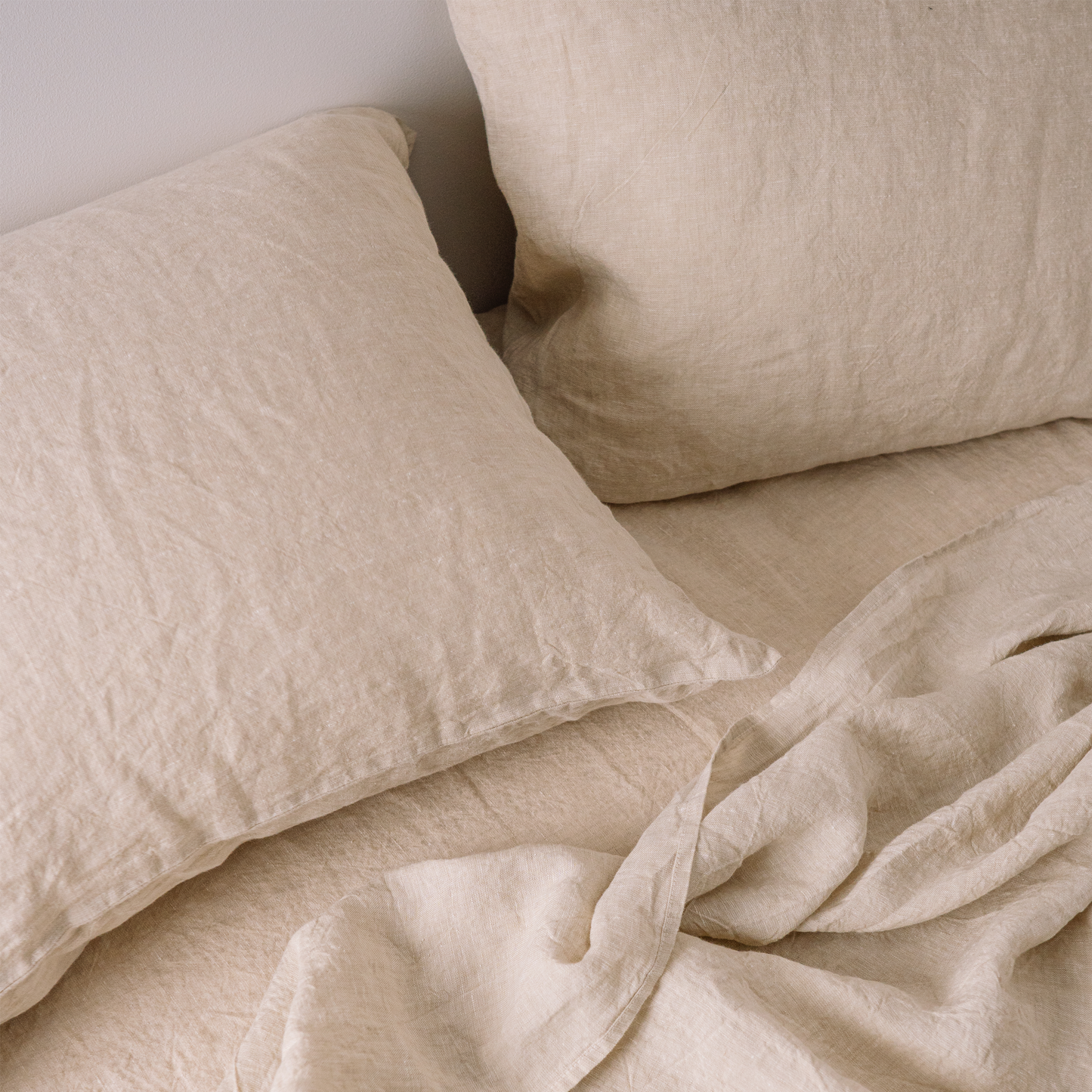 A closeup of a pair of pillowcases in Sandy color