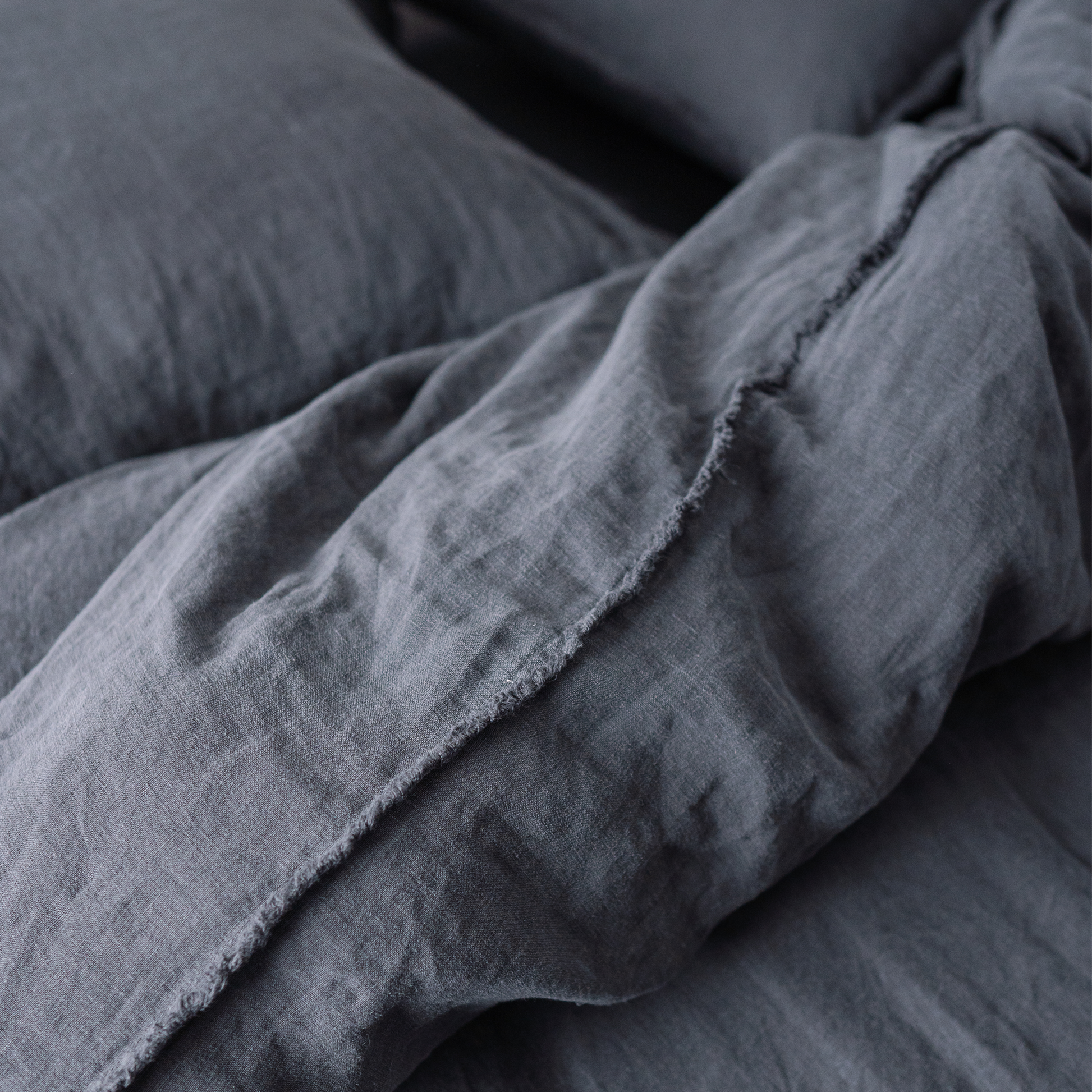 Dark Grey color Lewisii linen duvet fringe edges photo. 
