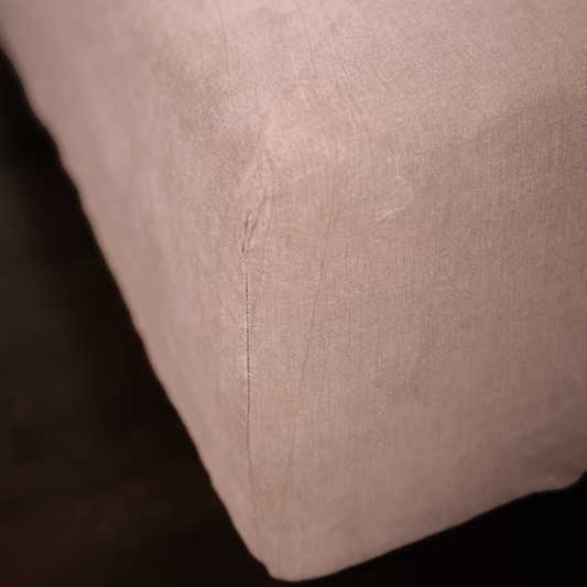 Cappuccino color fitted sheet close up photo with seam line
