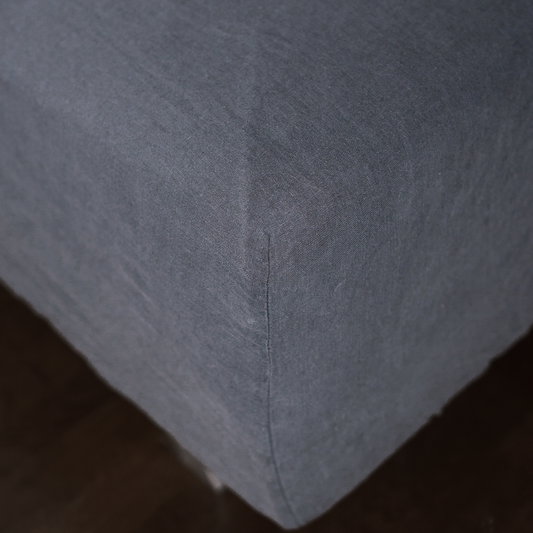 Dark Grey color fitted sheet close up photo with seam line