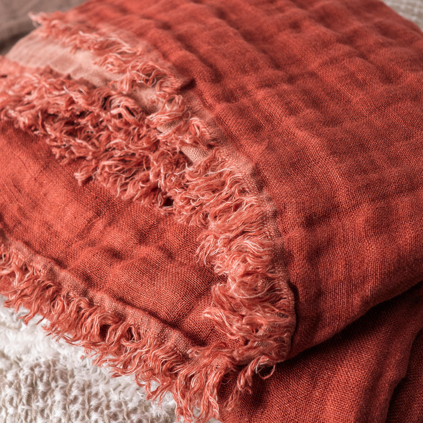 Three Layer linen blanket in rusty color close up photo