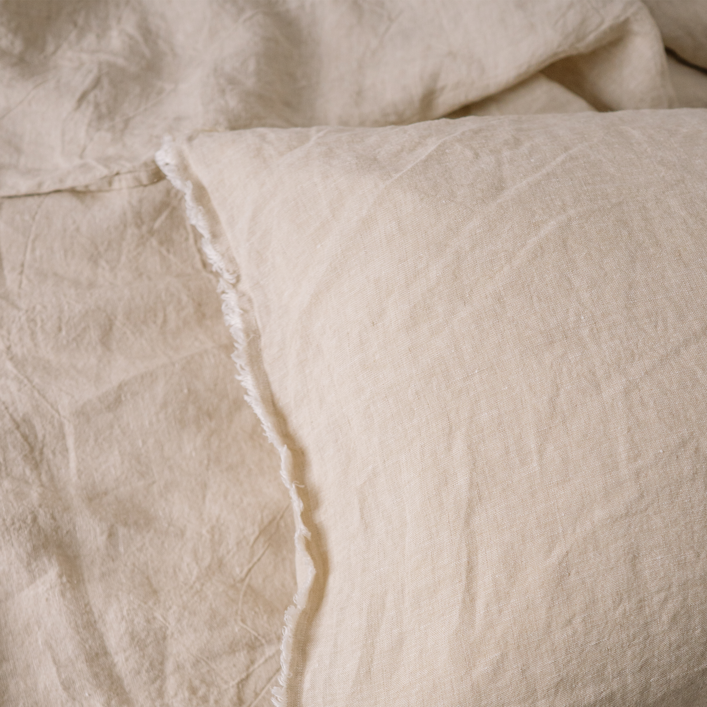 A closeup of pillowcases in color Sandy