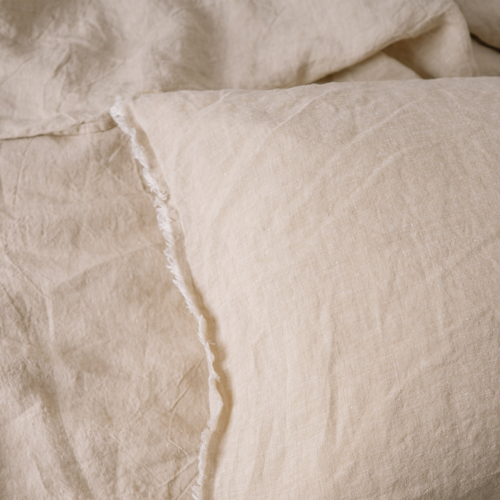 A closeup of pillowcases in color Sandy